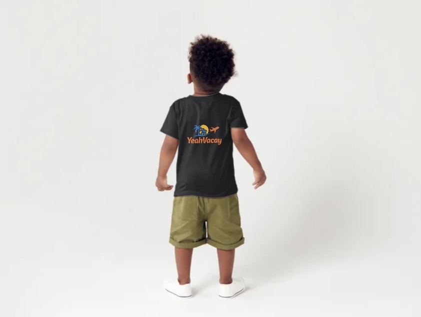 YeahVacay kids tee — toddler seated smiling