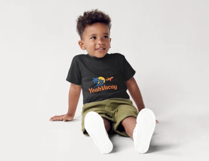 YeahVacay kids tee — child back view showing logo